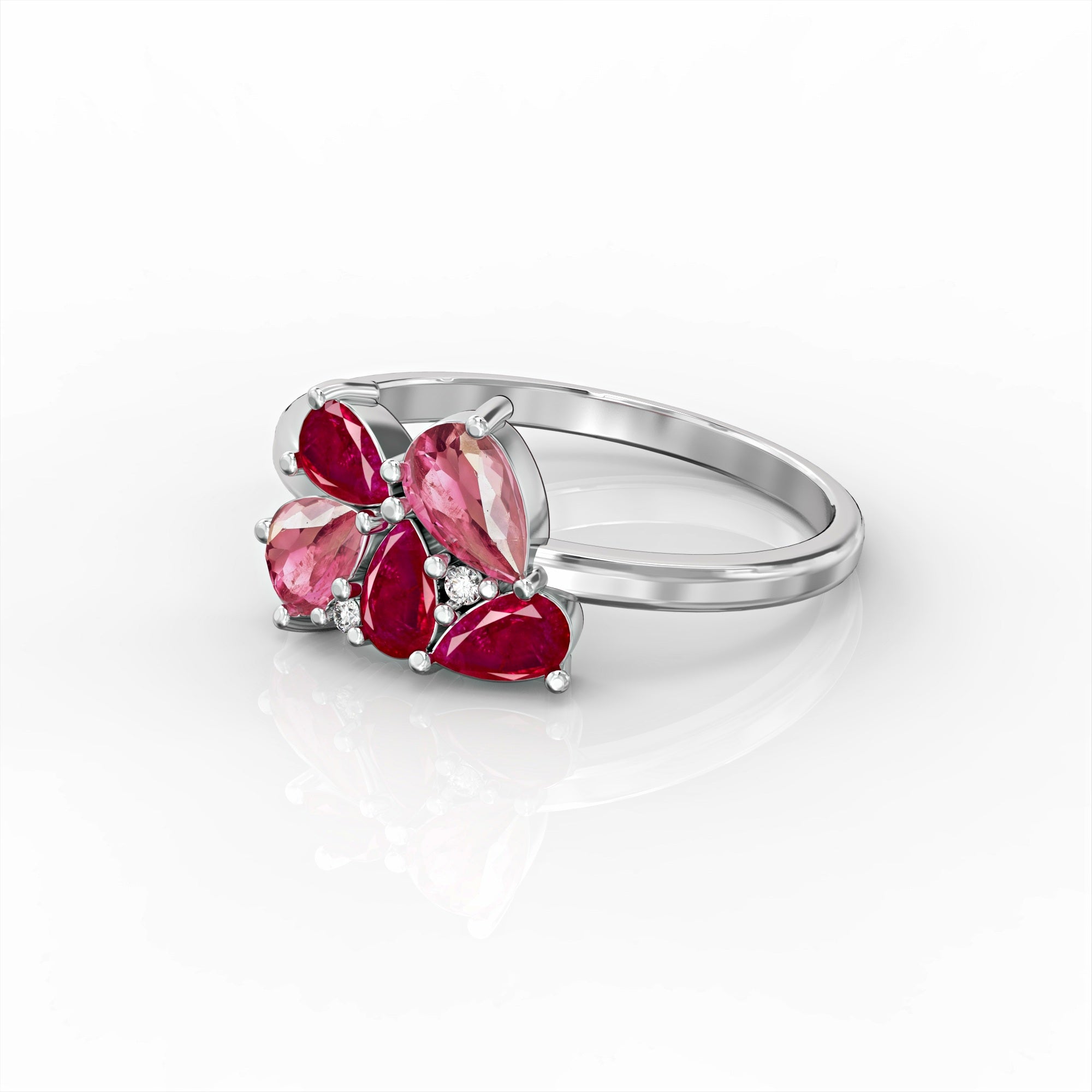 Scholarship ring - a cluster ring set with oval rubies, drop morganite and diamonds