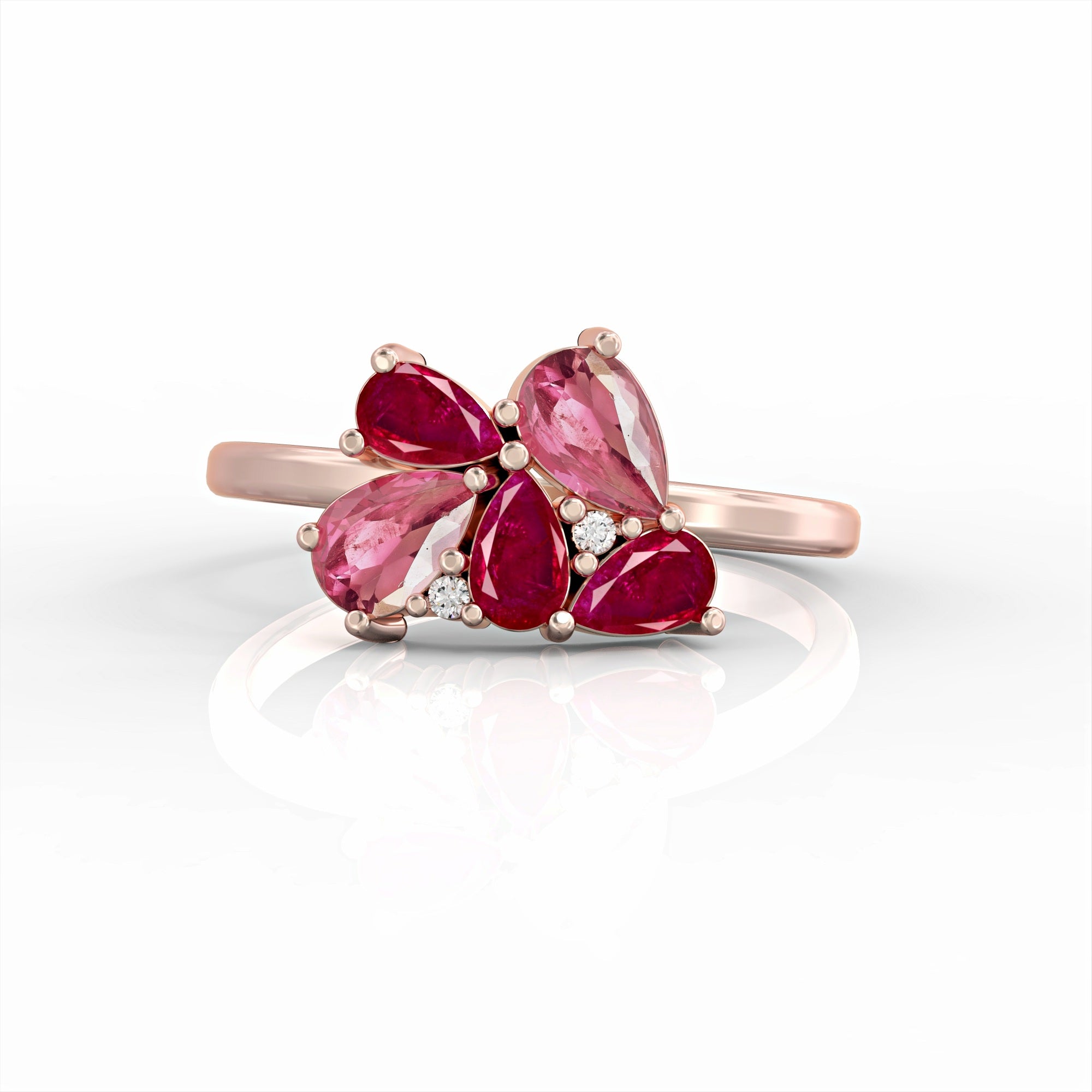 Scholarship ring - a cluster ring set with oval rubies, drop morganite and diamonds