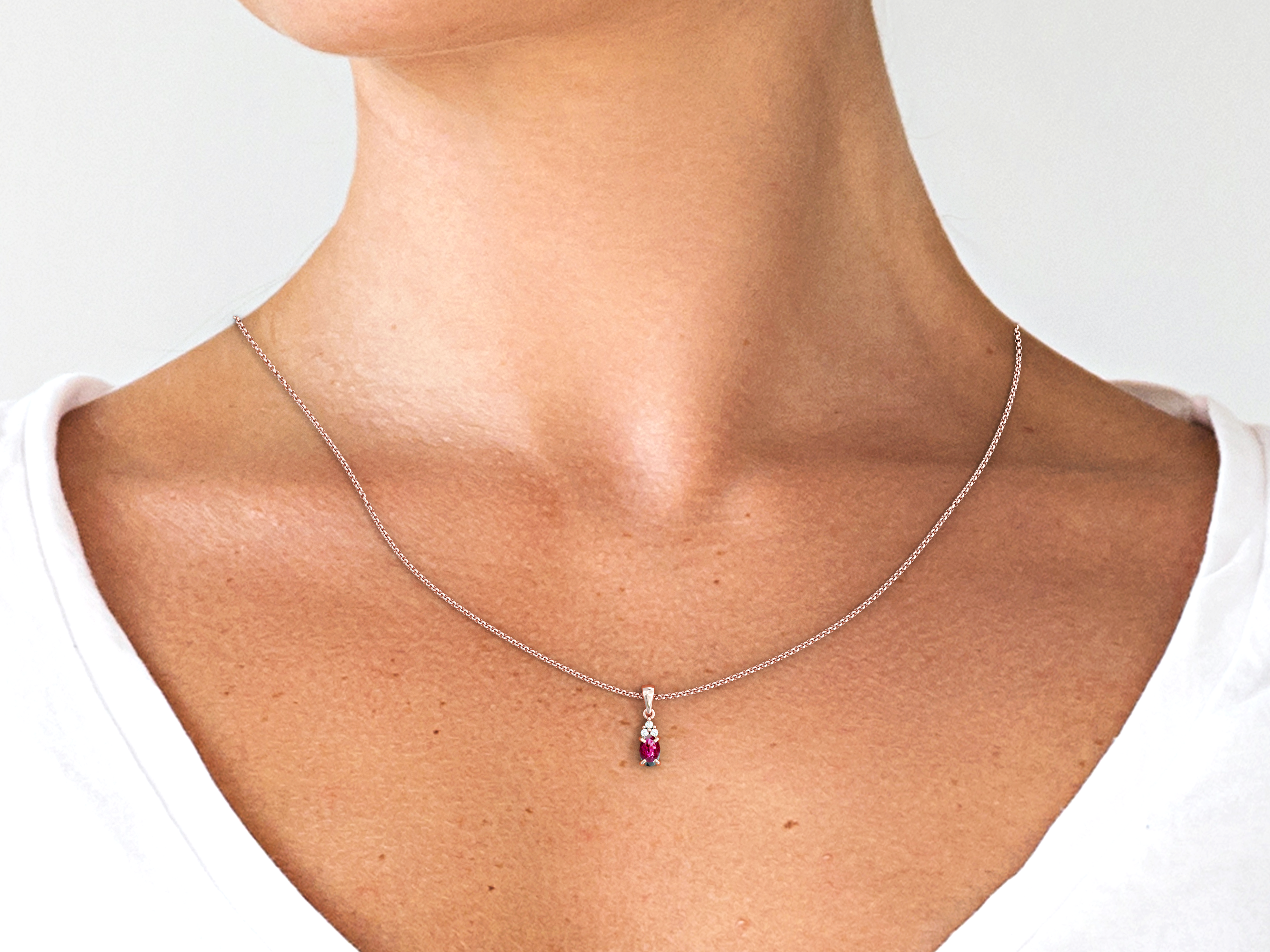 Petra necklace - oval ruby and diamond pendant
