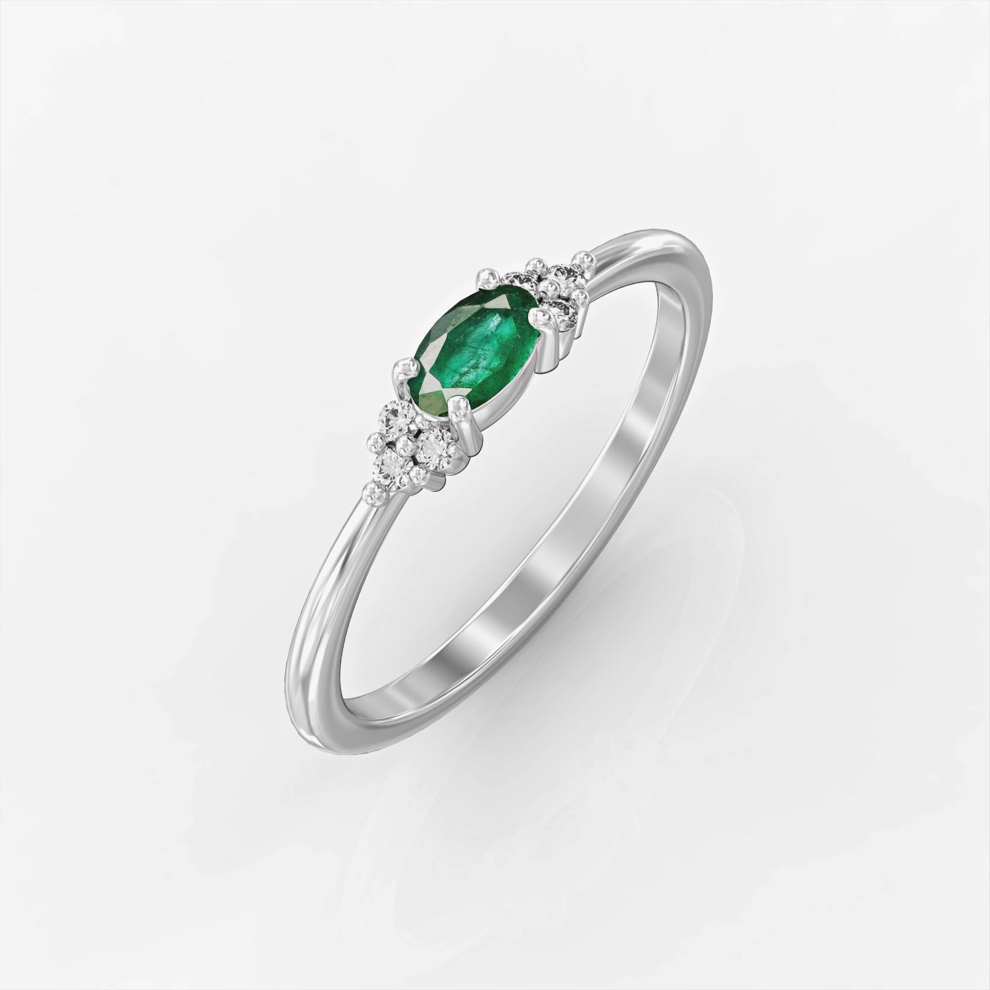 Bella Ring - ring studded with emeralds and Bella diamonds 