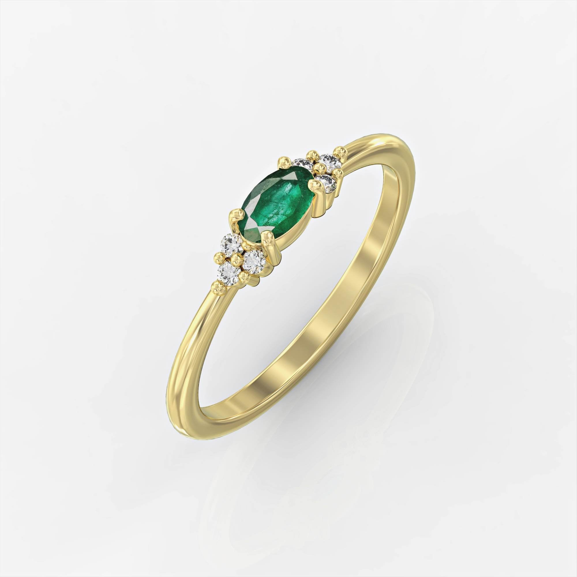 Bella Ring - ring studded with emeralds and Bella diamonds 