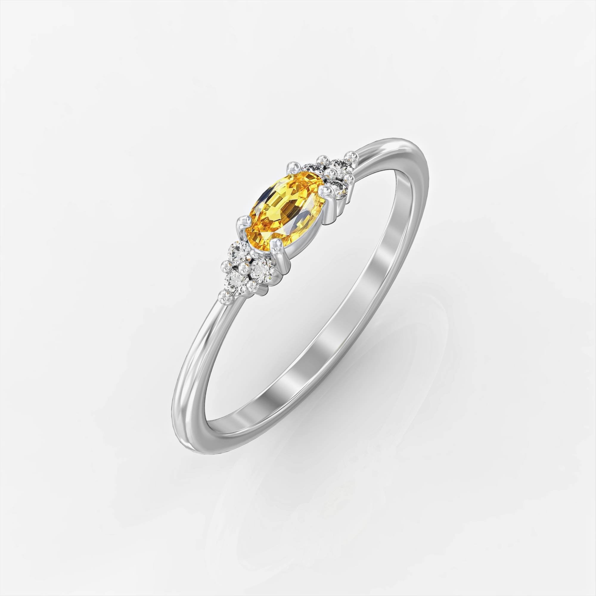 Bella ring - a ring set with yellow sapphires and Bella diamonds 