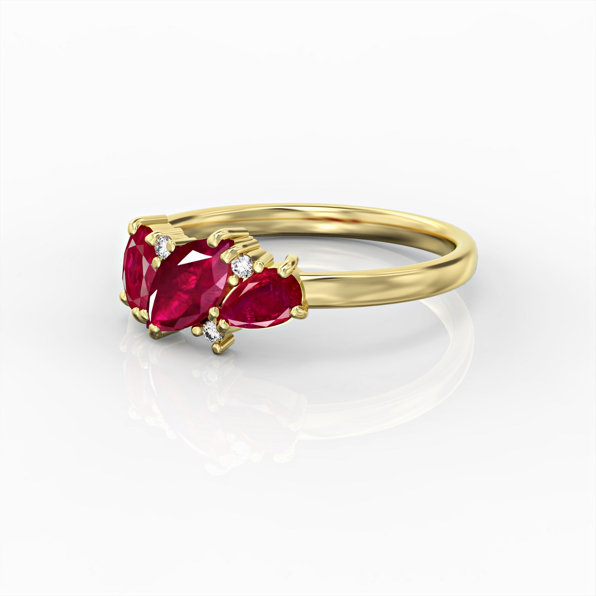 Kan ring - a cluster ring set with marquise, oval, drop and diamond rubies