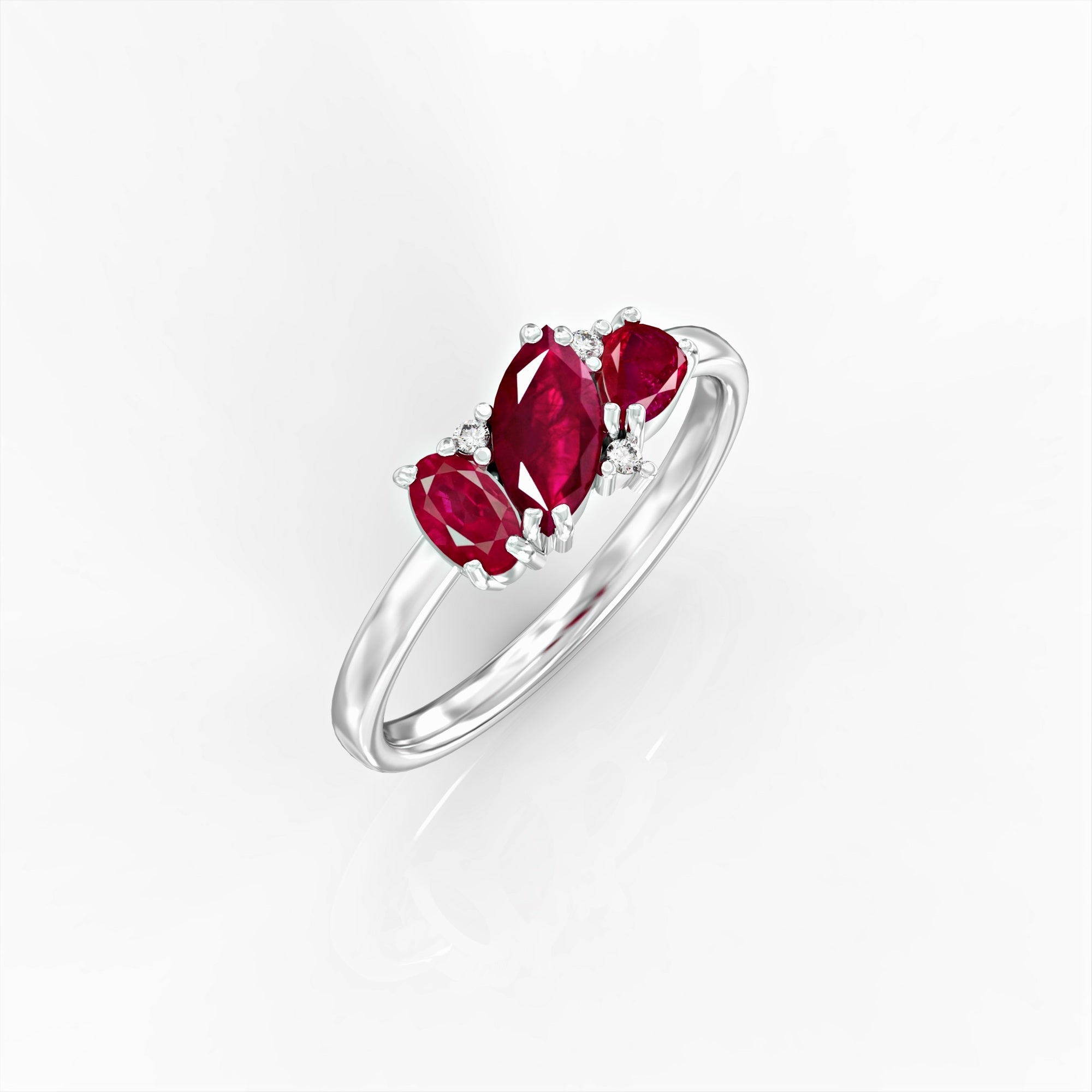 Kan ring - a cluster ring set with marquise, oval, drop and diamond rubies