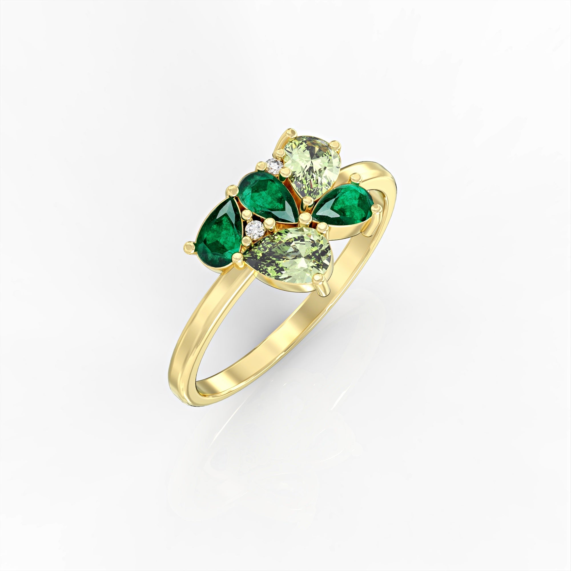 Scholarship ring - a cluster ring set with an emerald and a drop peridot and diamonds 