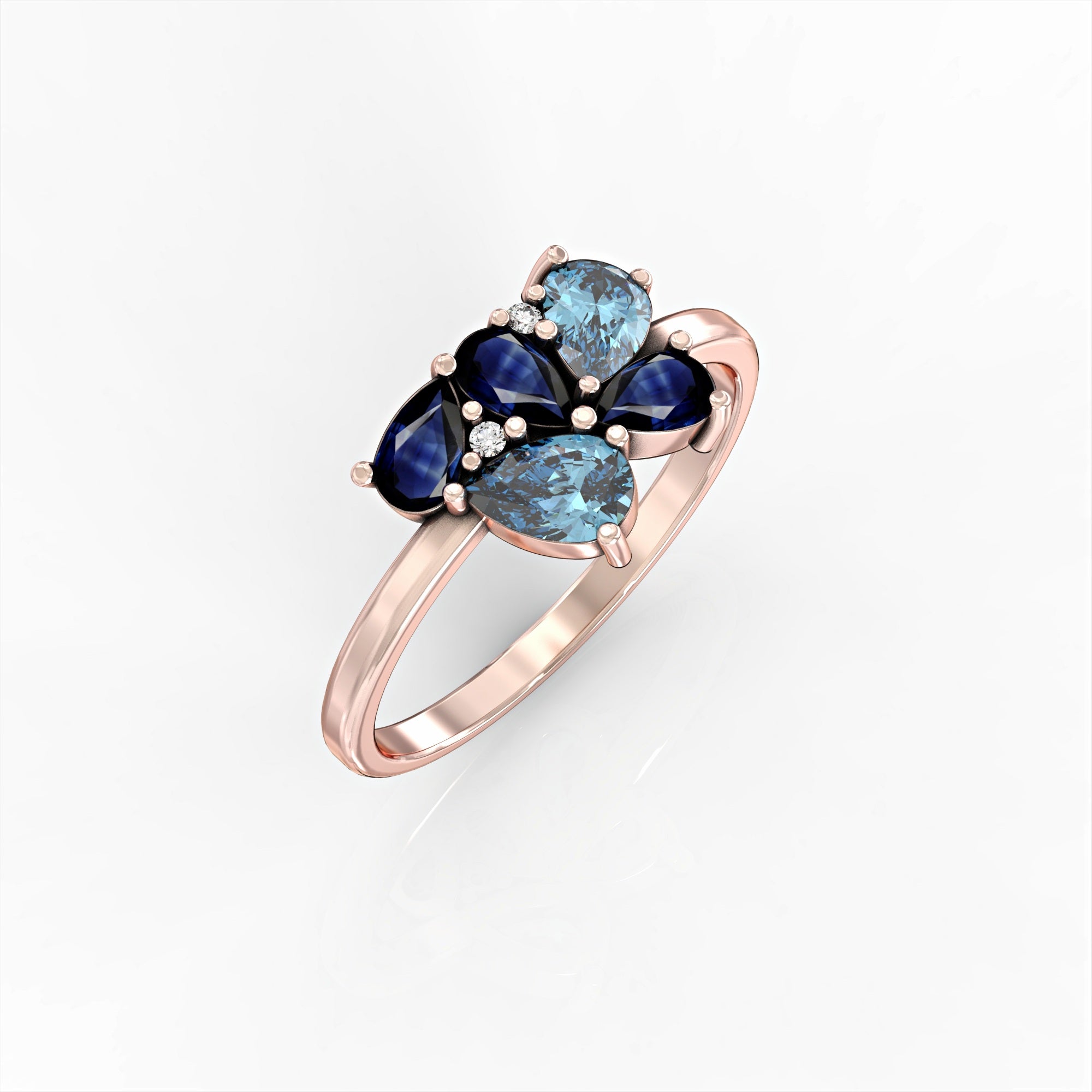 Scholarship ring - a cluster ring set with a drop of sapphire and aquamarine and diamonds 