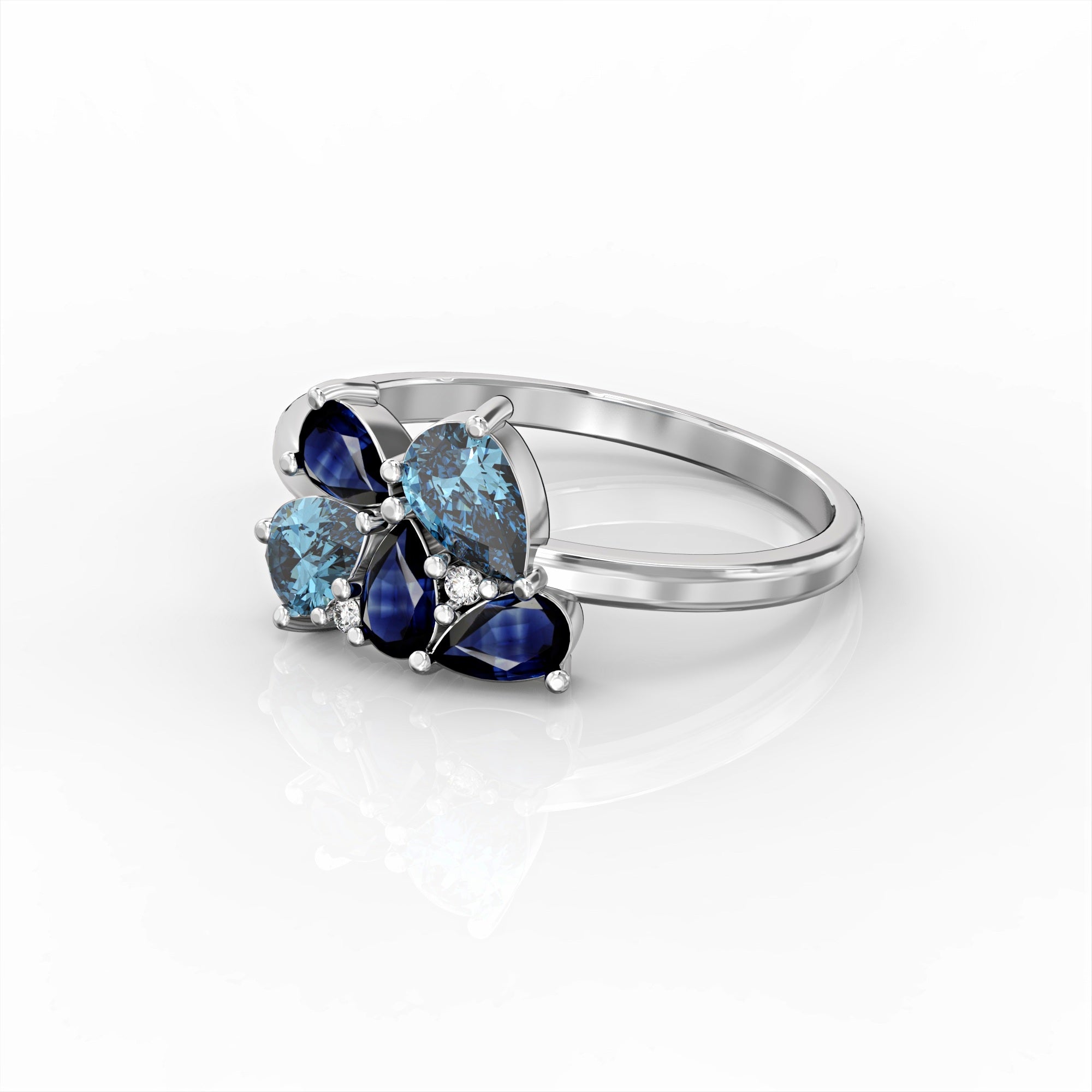 Scholarship ring - a cluster ring set with a drop of sapphire and aquamarine and diamonds 