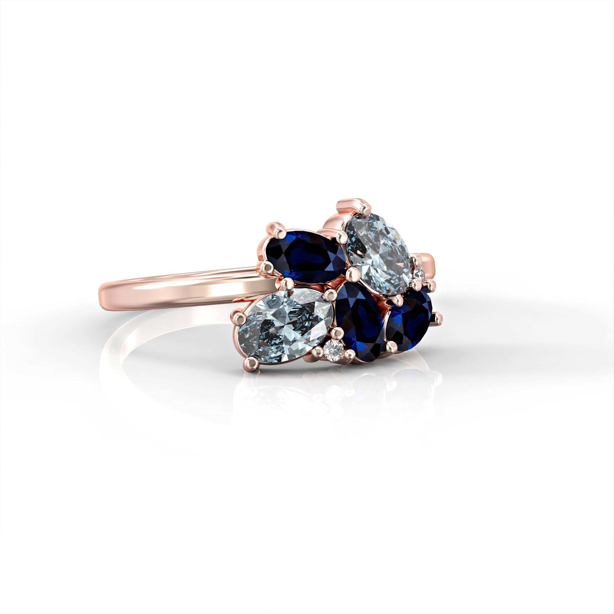 Majorca ring - a cluster ring set with an oval sapphire, a drop of aquamarine and diamonds