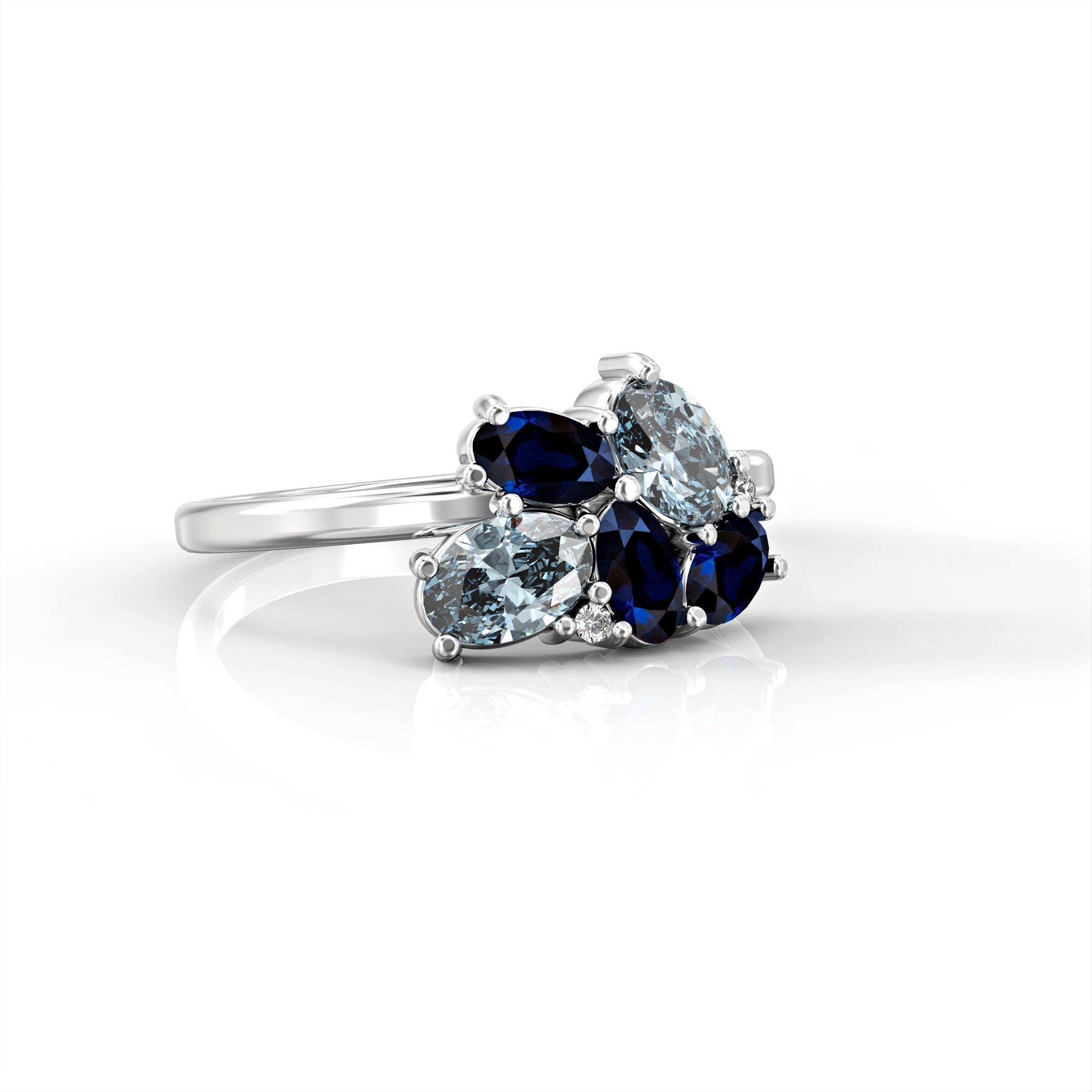 Majorca ring - a cluster ring set with an oval sapphire, a drop of aquamarine and diamonds