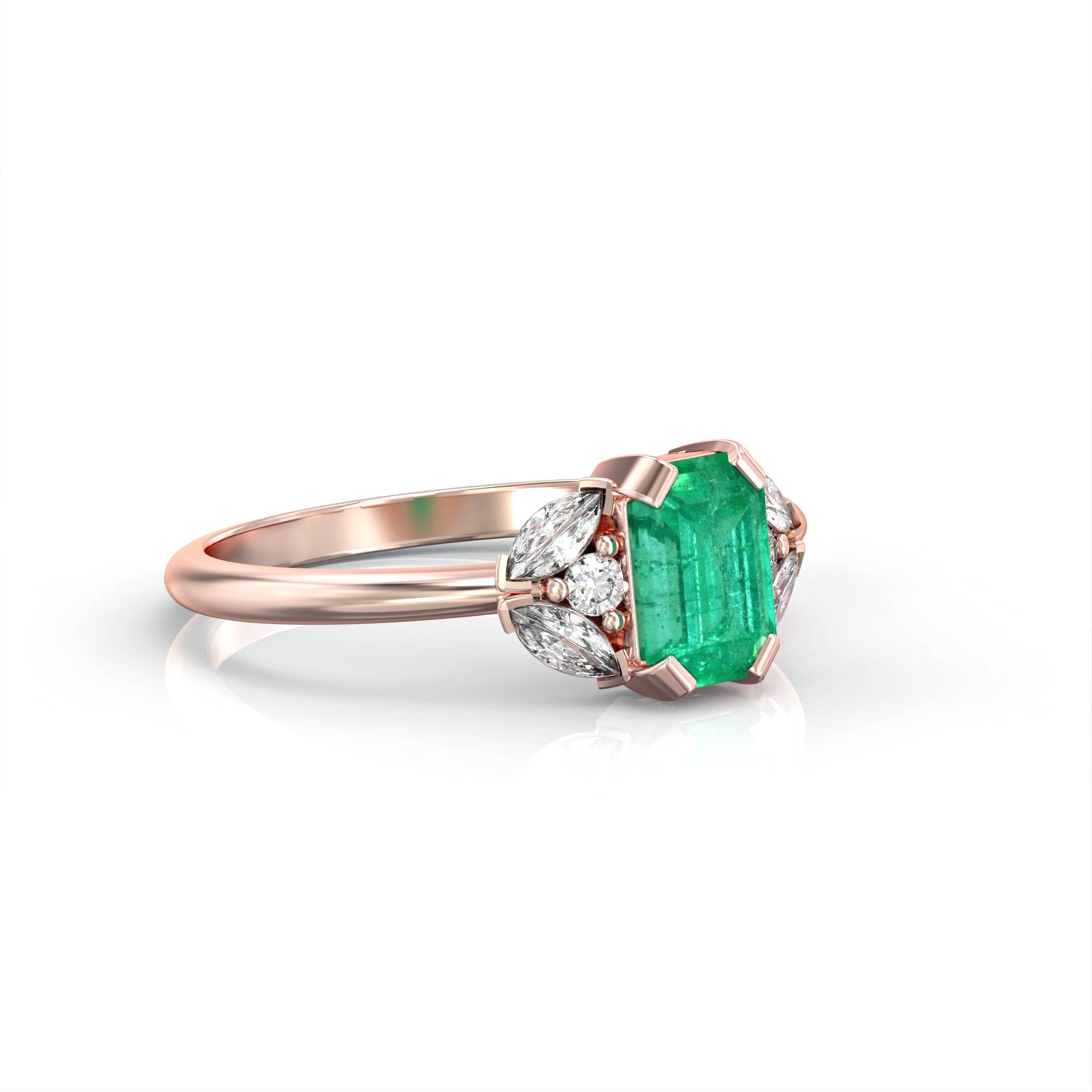 Capri - an engagement ring set with emeralds and diamonds