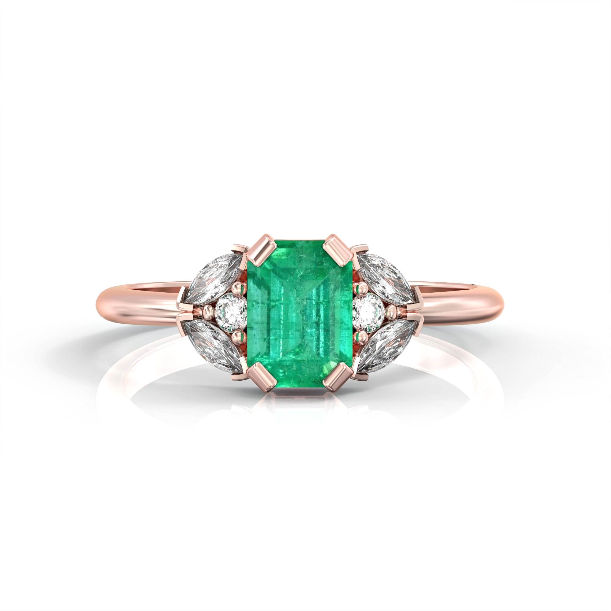 Capri - an engagement ring set with emeralds and diamonds