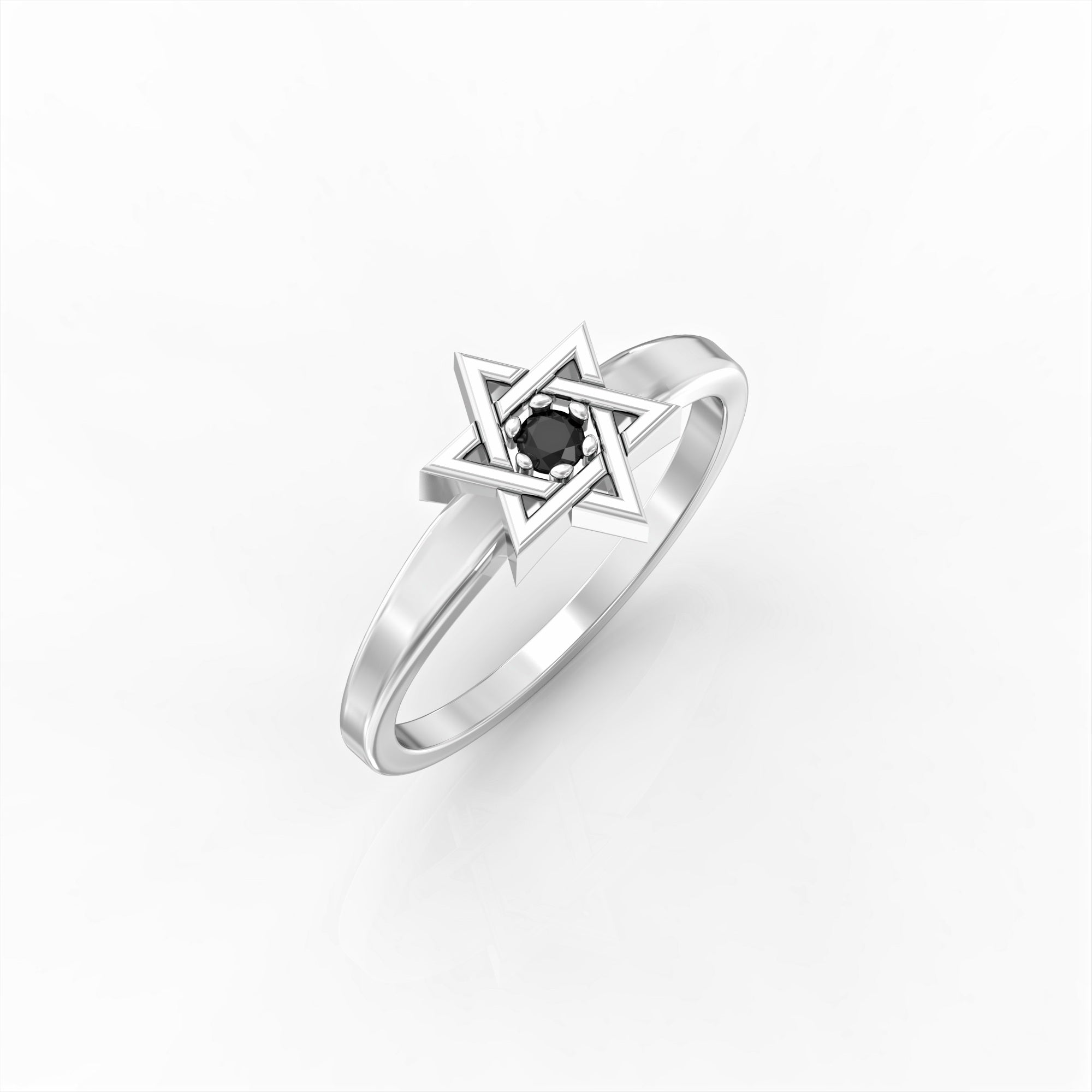 A Star of David ring set with a black diamond 