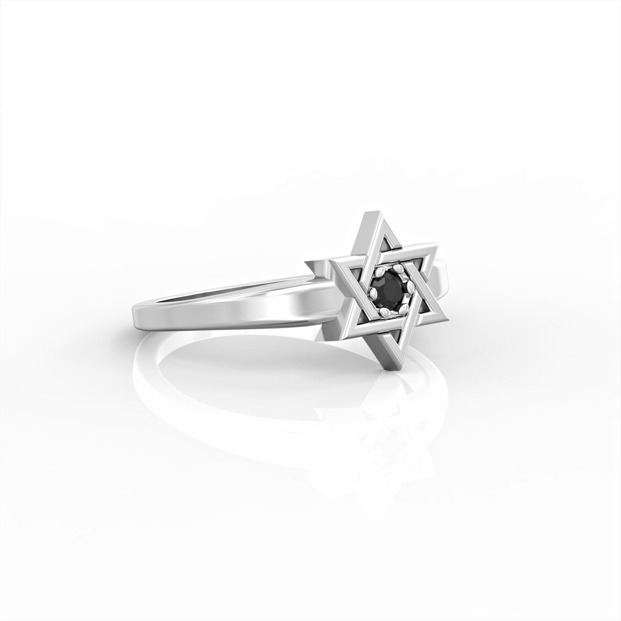 A Star of David ring set with a black diamond 