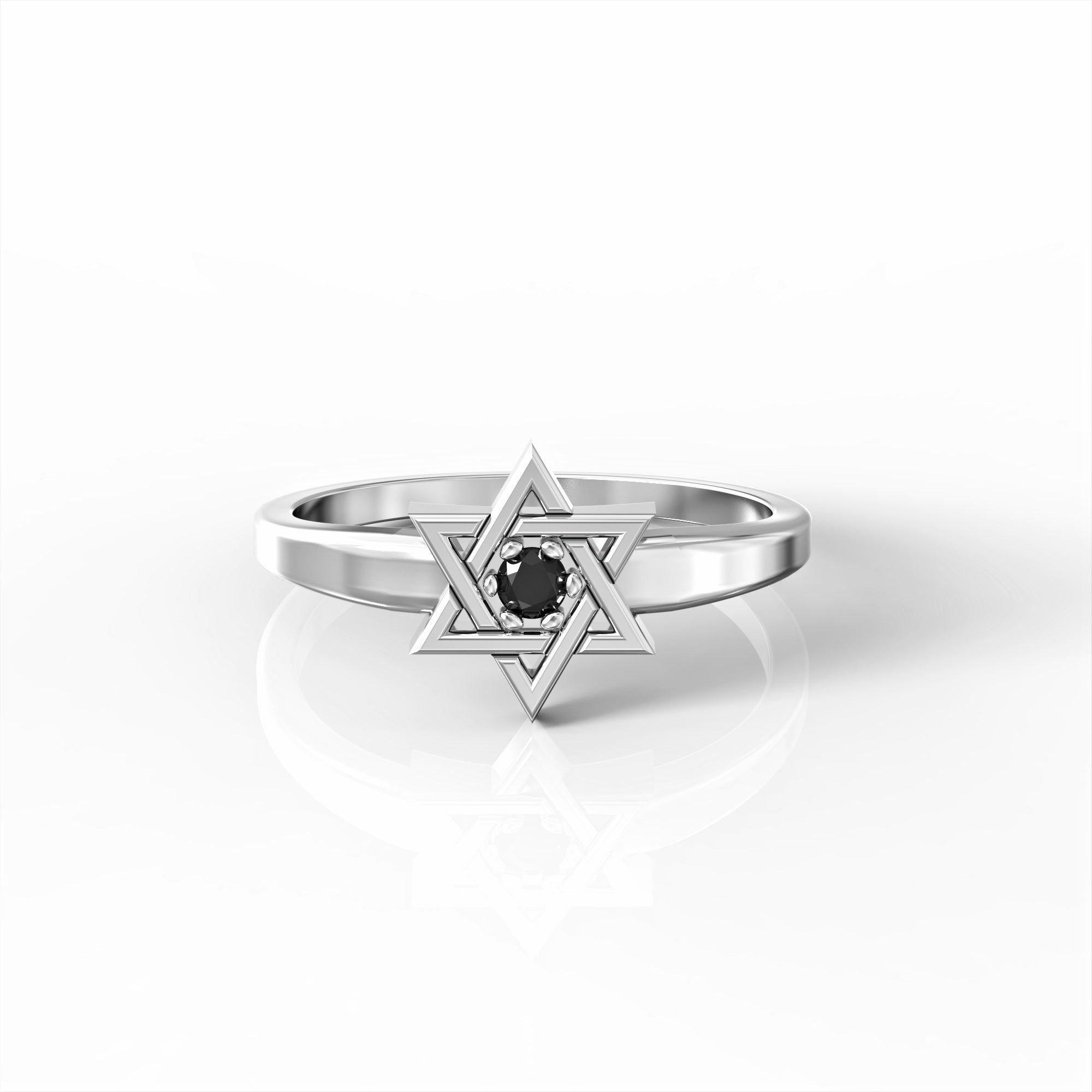 A Star of David ring set with a black diamond 