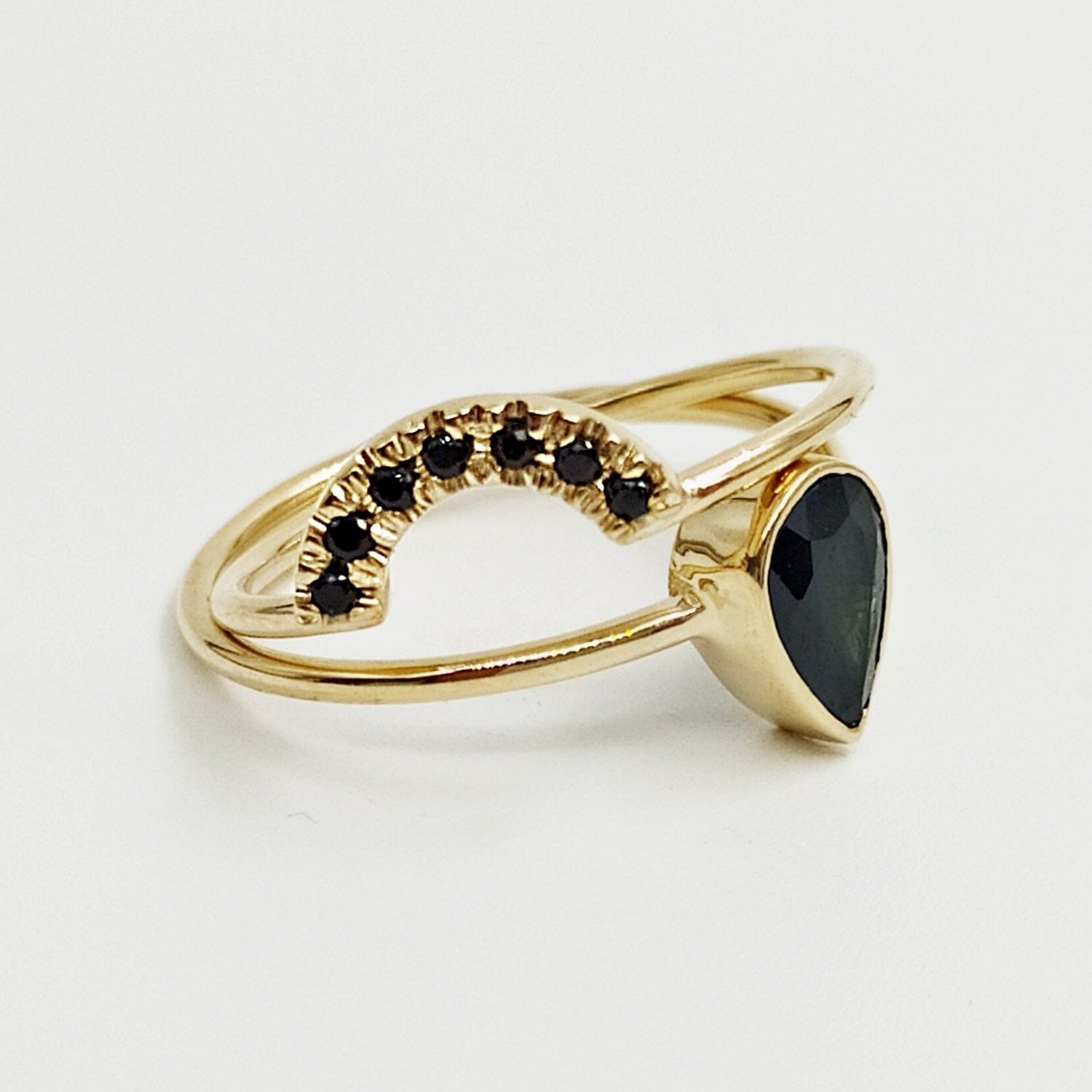 Negroni rings - a pair of complementary rings set with black drop sapphires and black diamonds