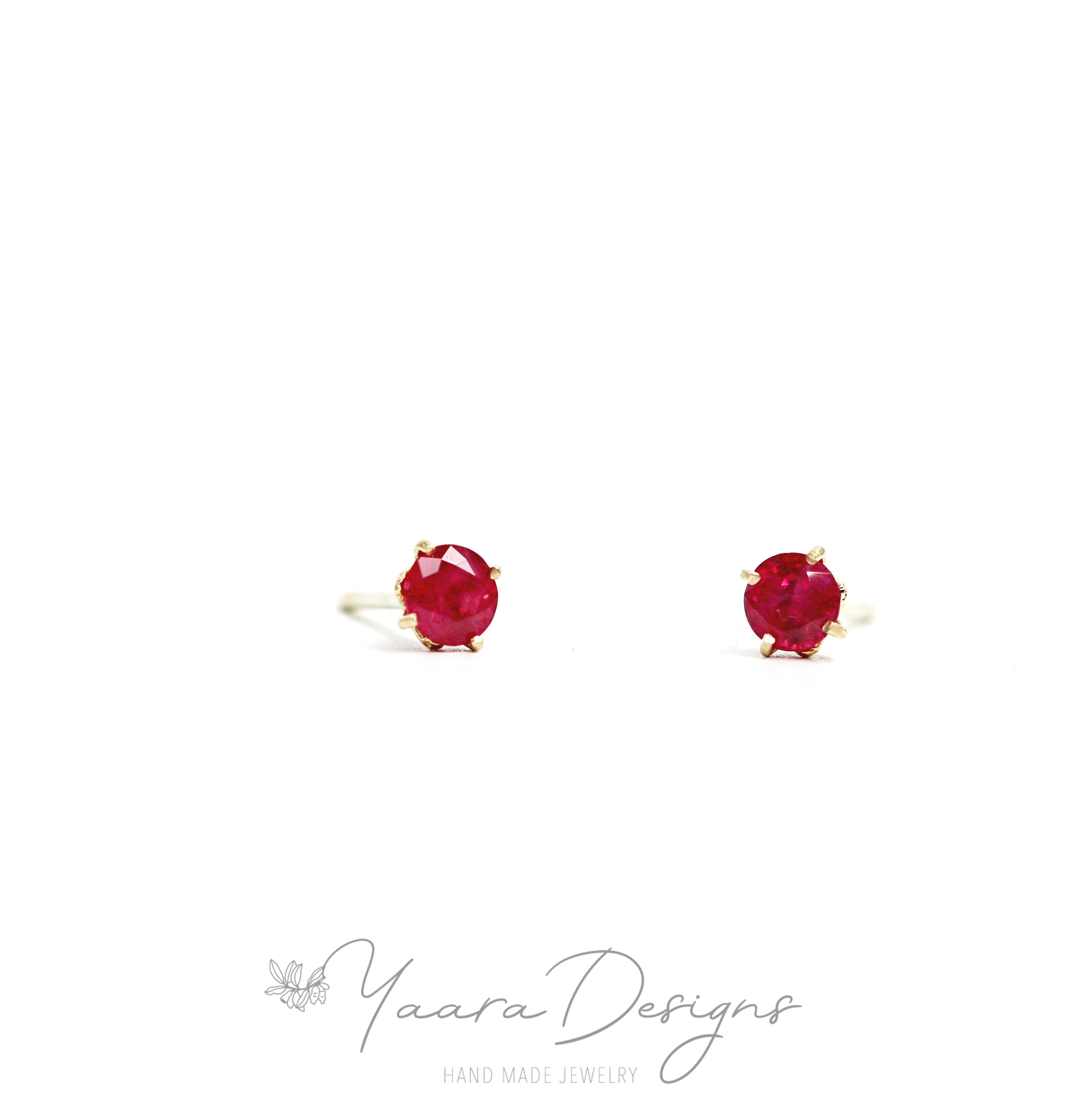 Eternal earrings - stud earrings studded with sapphires, emeralds or Eternal S rubies