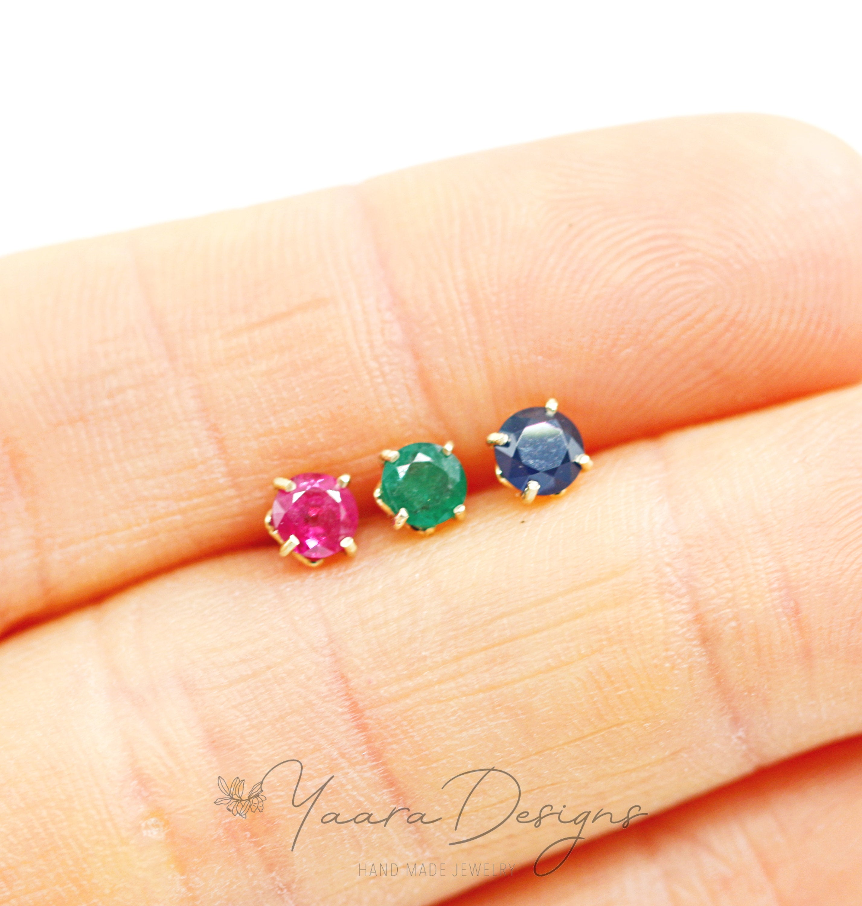 Eternal earrings - stud earrings studded with sapphires, emeralds or Eternal S rubies