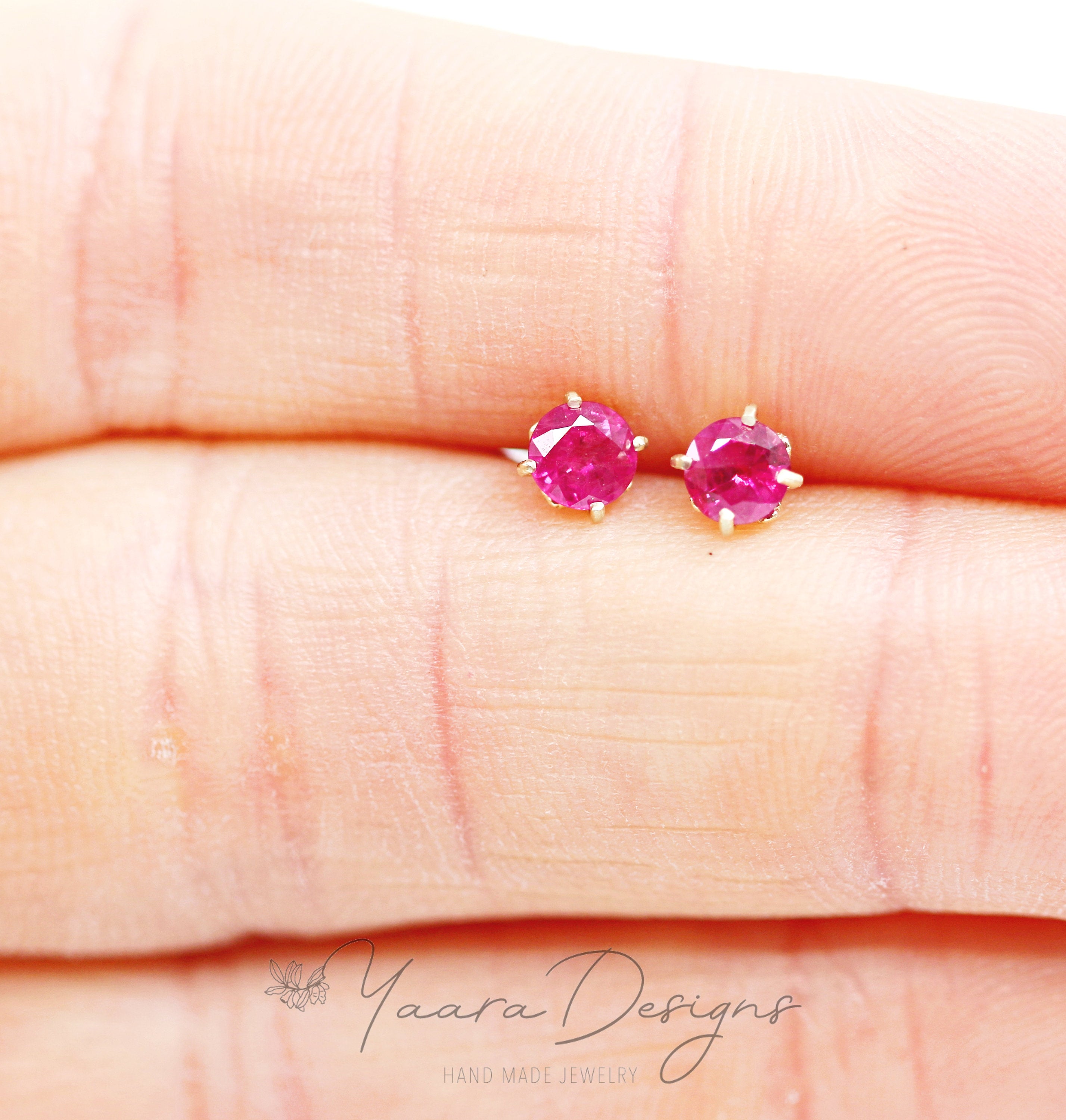 Eternal earrings - stud earrings studded with sapphires, emeralds or Eternal S rubies