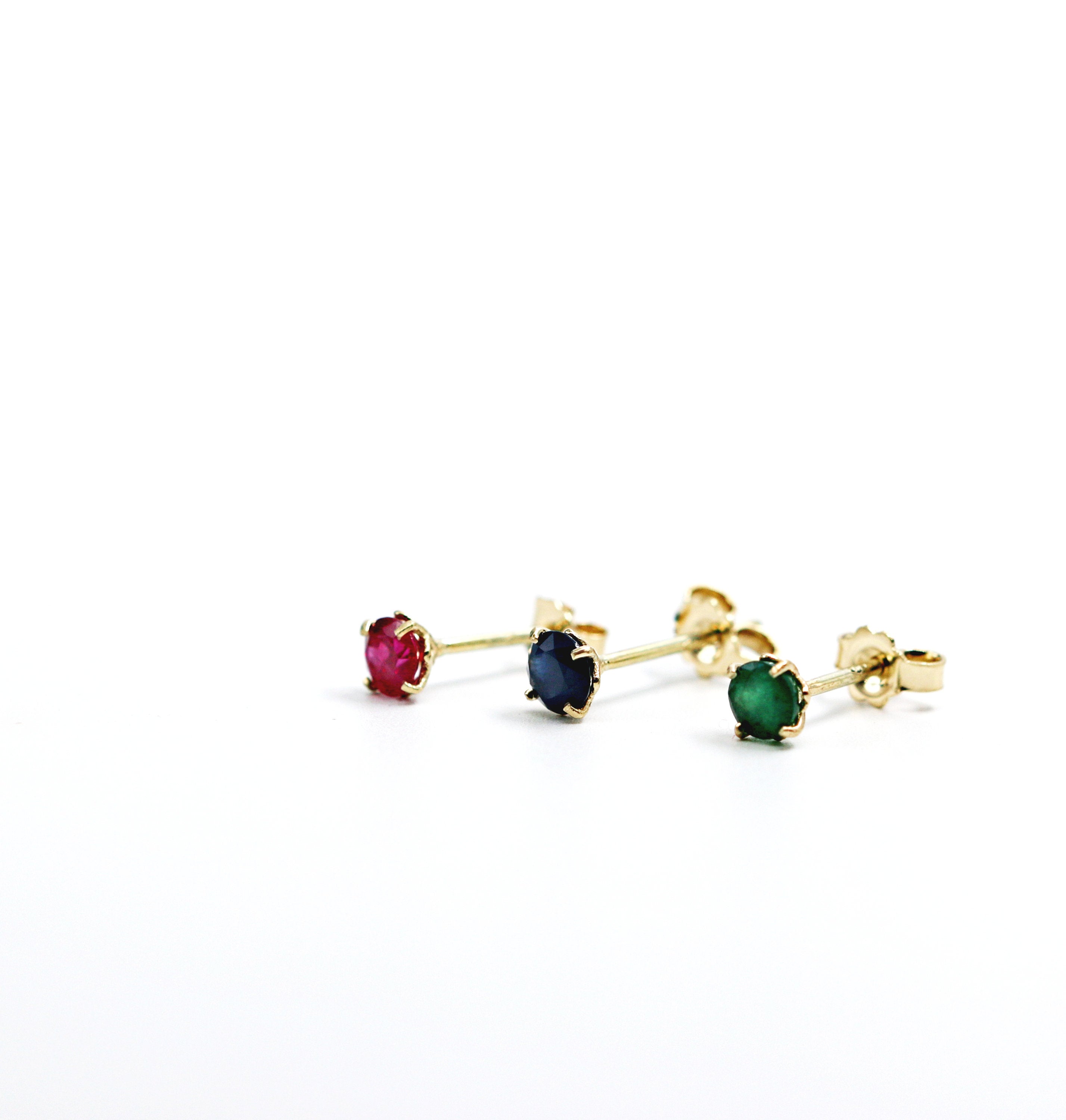 Eternal earrings - stud earrings studded with sapphires, emeralds or Eternal S rubies