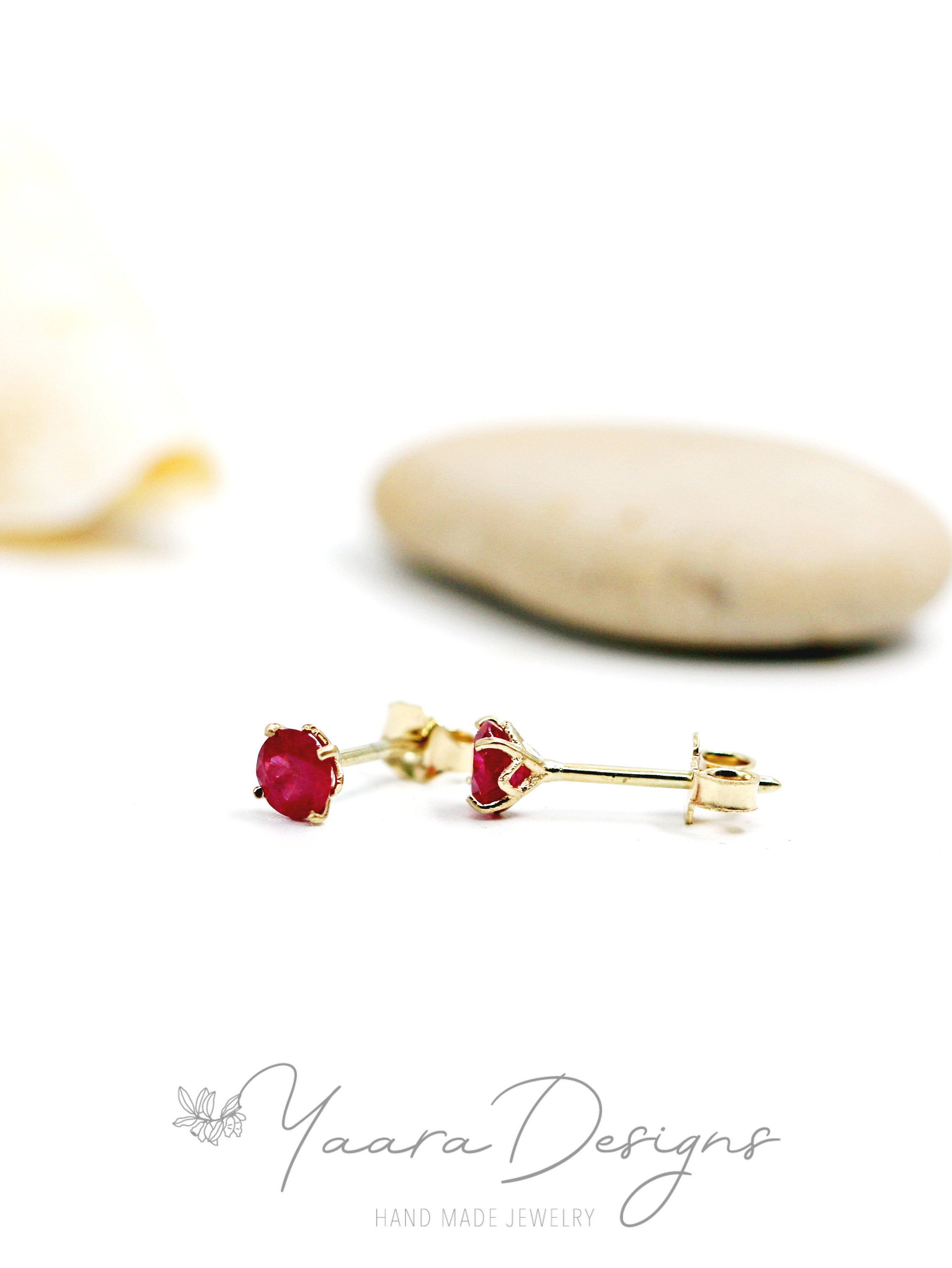 Eternal earrings - stud earrings studded with sapphires, emeralds or Eternal S rubies