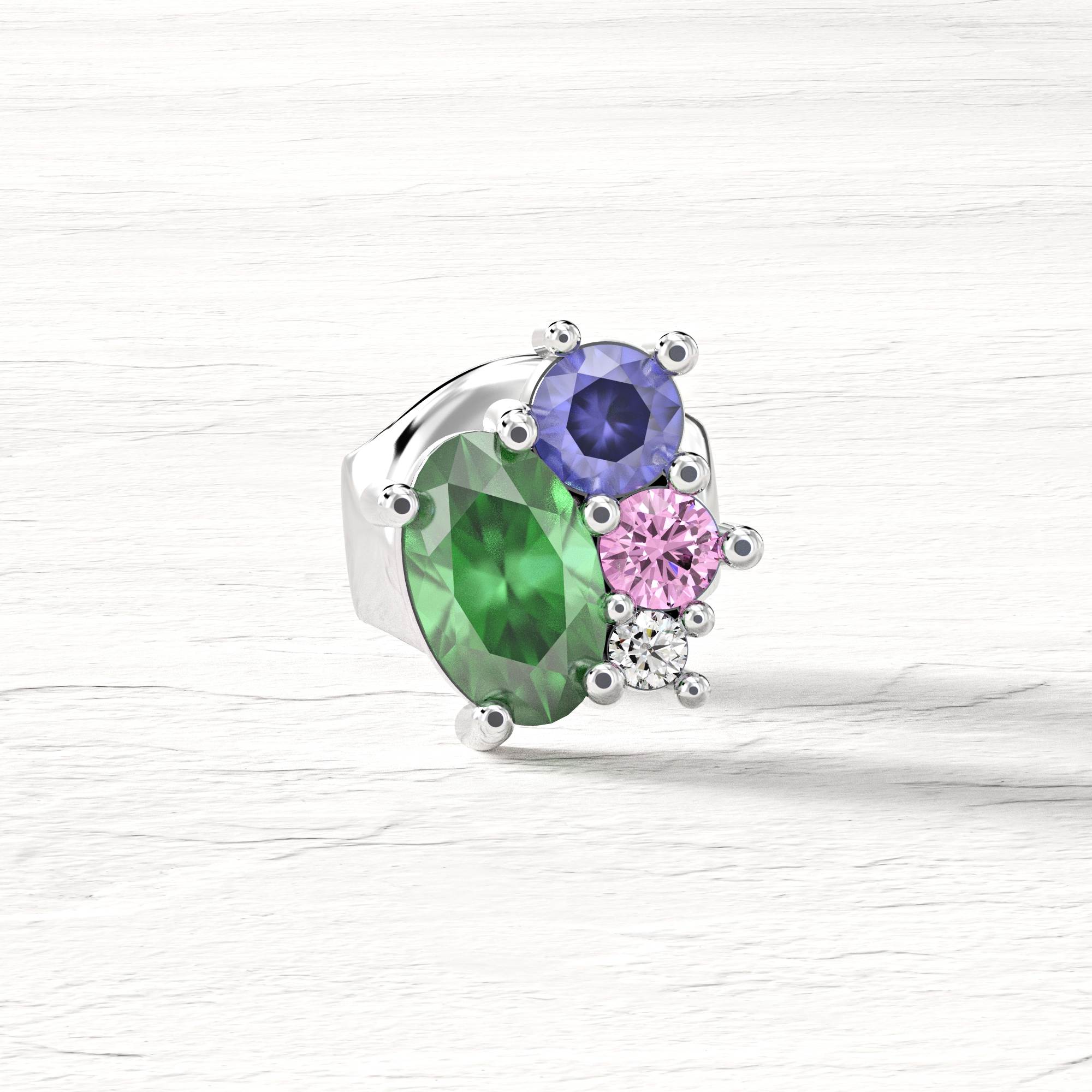 "Sweet Dream" earrings - an oval diamond, emerald, sapphire and tanzanite cluster earring